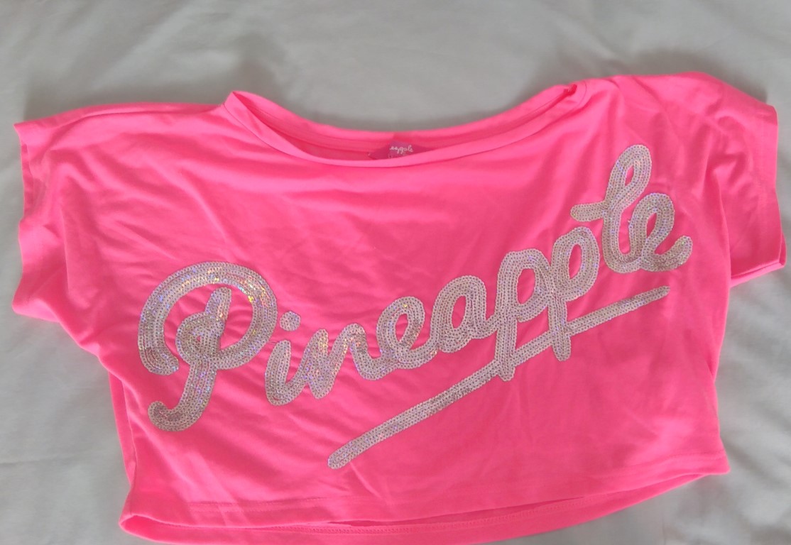 Pineapple crop top pink age 7-8 but large probably more like 10-11 Pineapple crop top pink says age 7-8 but large probably more like 10-11